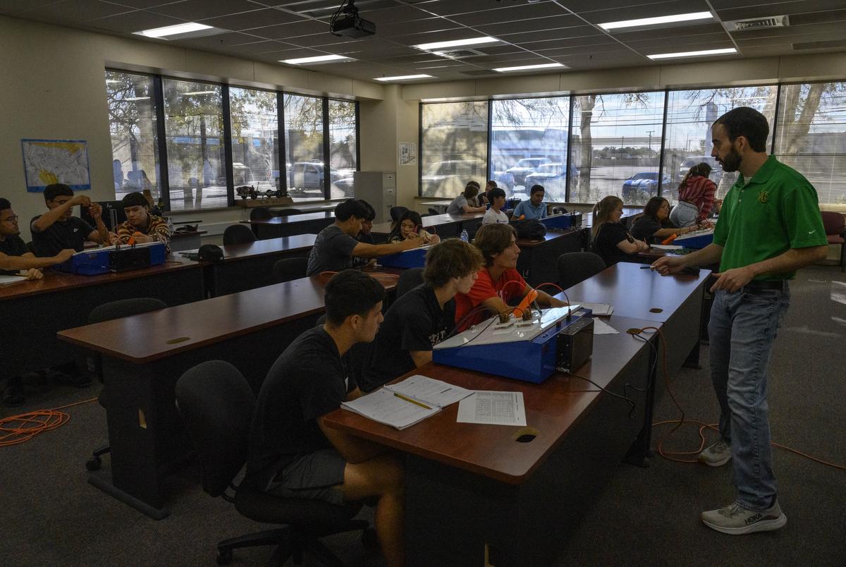 Midland College assistant professor Anthony Cummins, far right, instructs area high school students during an Oil and Gas Production II class Monday, Nov. 6, 2023, in Midland. The Oil and Gas Production class was designed by the Midland Independent School District to teach students vocational oil and gas studies.