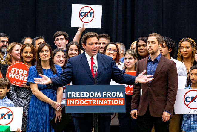 Florida Gov. Ron DeSantis addresses the crowd before publicly signing the Stop WOKE Act in April 2022.