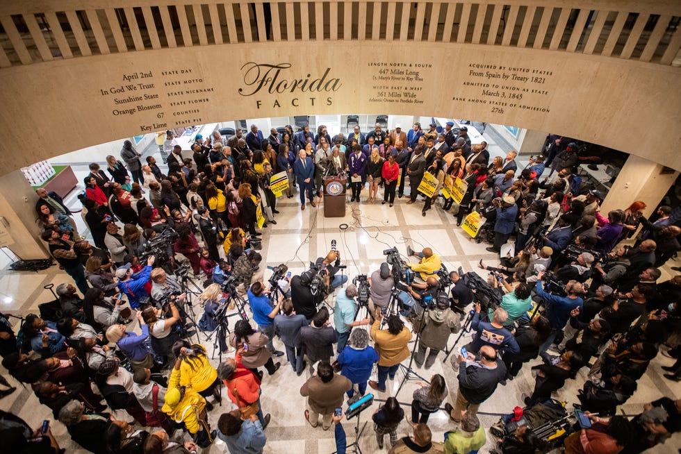 A large crowd gathered in the Florida Capitol fourth floor rotunda for the 'Stop the Black Attack' in January. Attorney Ben Crump threatened to file a lawsuit against Gov. Ron DeSantis and his administration over the ban of an Advanced Placement course on African American Studies in Florida high schools on behalf of three Leon County school students.