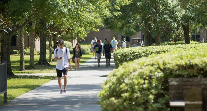Students walk on Tallahassee Community College's campus.