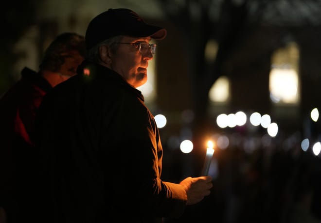 Hundreds gathered for a vigil on Nov. 14, 2022, after a shooting at the University of Virginia killed three people and injured two.