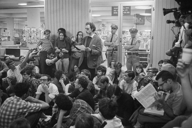 Students for a Democratic Society leader Mario Savio speaks to demonstrators at a sit-in at U.C. Berkeley on Nov. 30, 1966.