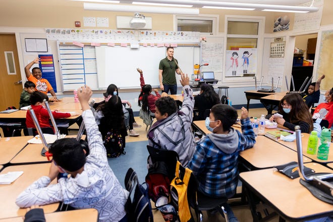 Fourth-grade teacher Rodney LaFleur conducting class at Nystrom Elementary in Richmond, Calif., on Friday, Apr 21, 2023; Richmond, California.